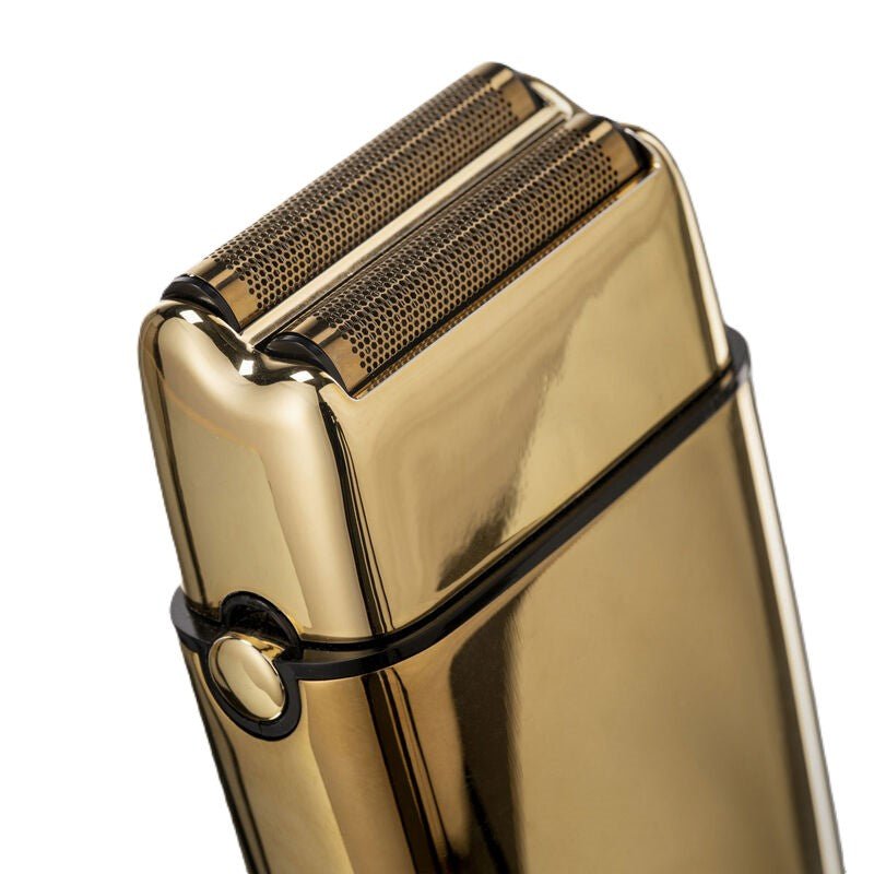 Shaver FoilFX02 Gold con doppia Lama in Titanio - HairShopXHairShopXHairShopX1000010000Shaver FoilFX02 Gold con doppia Lama in Titanio close - up view of the professional gold shaver design